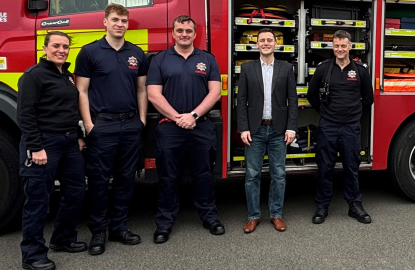 Dr Luke Evans MP and local firefighters